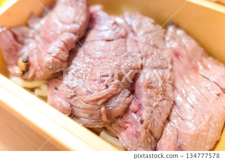 High-quality sliced beef served in a bento box 134777578