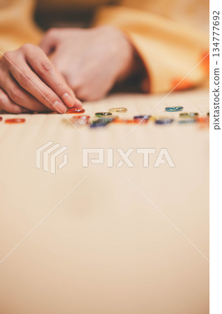Beautiful young kimono woman with marbles Beautiful young kimono woman with marbles 134777692