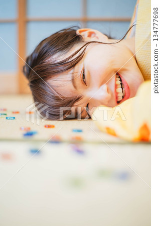 Beautiful young kimono woman with marbles Beautiful young kimono woman with marbles 134777698