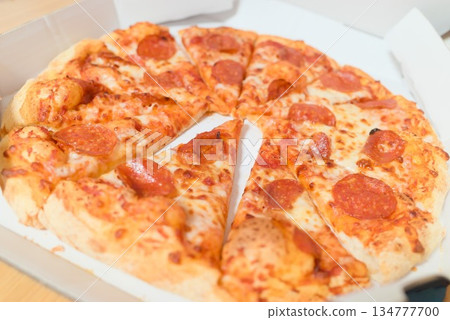 Variety of pizzas lined up at a celebration Variety of pizzas lined up at a celebration 134777700