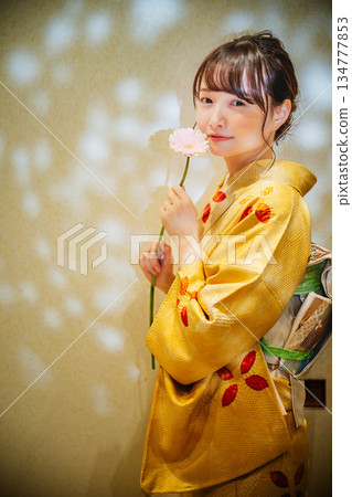 A young lady in kimono 134777853
