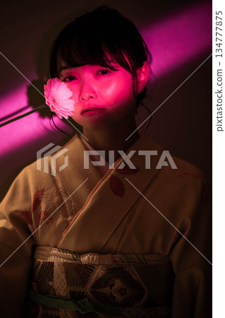 A young lady in kimono A young lady in kimono 134777875