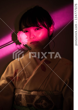 A young lady in kimono A young lady in kimono 134777876