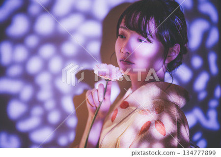 A young lady in kimono 134777899