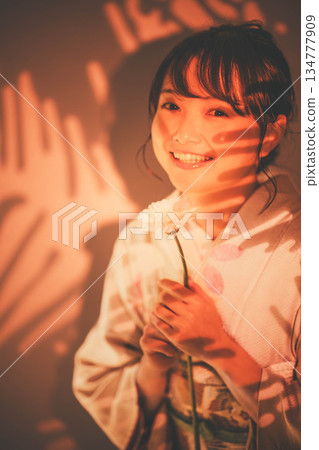A young lady in kimono A young lady in kimono 134777909