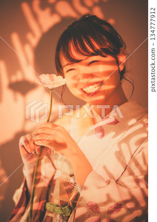 A young lady in kimono 134777912