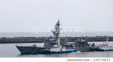 An escort ship entering port An escort ship entering port 134778013
