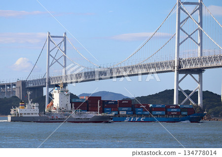 A ship passing through Seto Ohashi Bridge A ship passing through Seto Ohashi Bridge 134778014