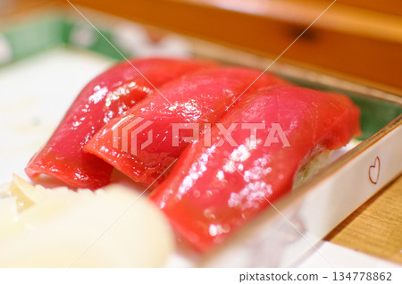 Lean tuna nigiri at a sushi restaurant Lean tuna nigiri at a sushi restaurant 134778862