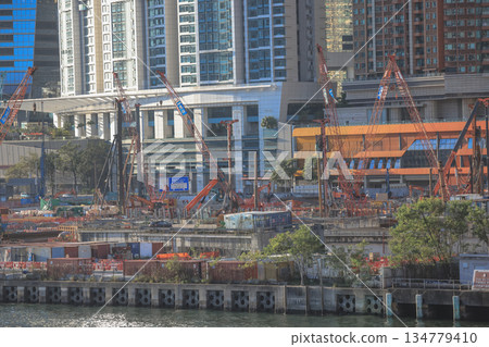 Oct 1 2025 Busy City Construction Site by Waterfront With Cranes and Modern Oct 1 2025 Busy City Construction Site by Waterfront With Cranes and Modern 134779410