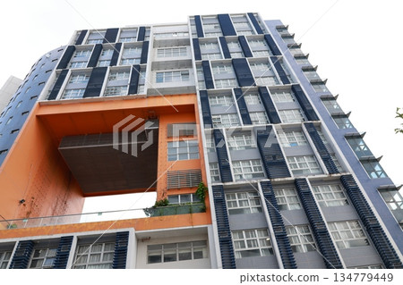 Aug 27 2025 Modern Blue Highrise With Orange Archway Connector Elevates Aug 27 2025 Modern Blue Highrise With Orange Archway Connector Elevates 134779449