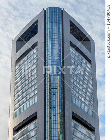 Modern skyscrapers towering against the blue sky and flowing clouds November 2025 Chuo Ward, Japan Modern skyscrapers towering against the blue sky and flowing clouds November 2025 Chuo Ward, Japan 134780415