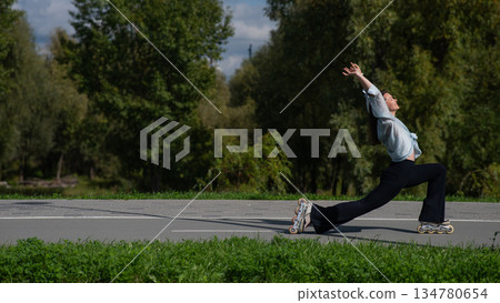 Caucasian woman roller skating in park. Caucasian woman roller skating in park. 134780654