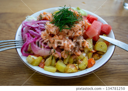 Salmon (gravlax) salad served at a cafe in Helsinki, Finland 134781250