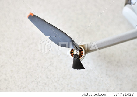 Drone propeller with visible damage and a broken tip, equipment malfunction 134781428