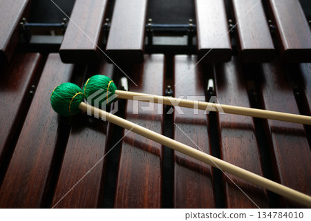 A marimba and the green mallets on top A marimba and the green mallets on top 134784010