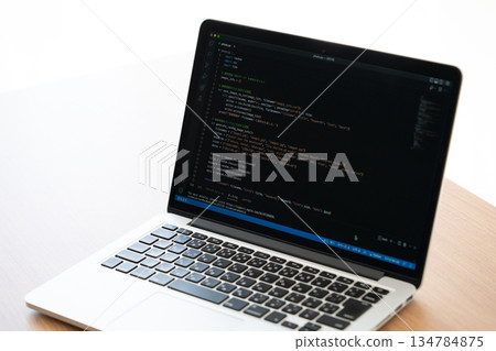 Laptop while studying Python 134784875