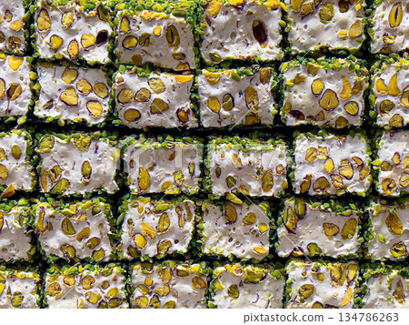Turkish delight lokum pieces with pistachio nuts 134786263