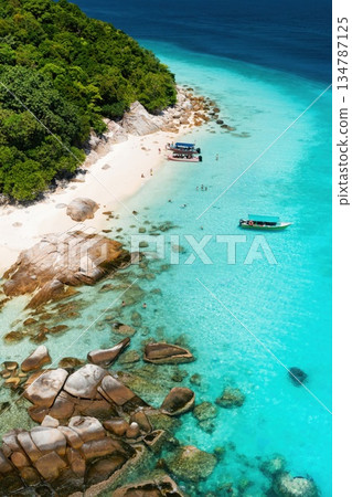 Aerial view of the white sand beach and coral reef on Lang Tengah Island, Terengganu, Malaysia Aerial view of the white sand beach and coral reef on Lang Tengah Island, Terengganu, Malaysia 134787125