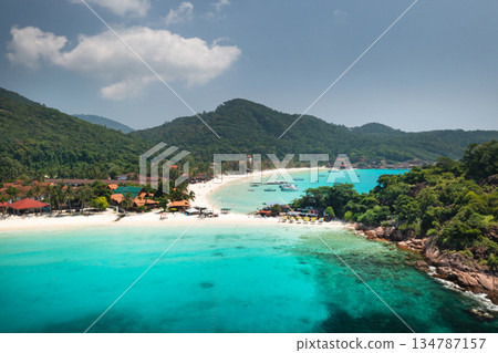 Stunning view of long beach with clear turquoise waters of Redang Island. Malaysia Stunning view of long beach with clear turquoise waters of Redang Island. Malaysia 134787157