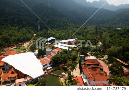View of the traditional village of Oriental Village, surrounded by lush greenery and scenic scenery on Langkawi Island. Malaysia View of the traditional village of Oriental Village, surrounded by lush greenery and scenic scenery on Langkawi Island. Malaysia 134787479