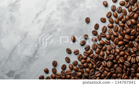 Roasted coffee beans in a concrete background Roasted coffee beans in a concrete background 134787841