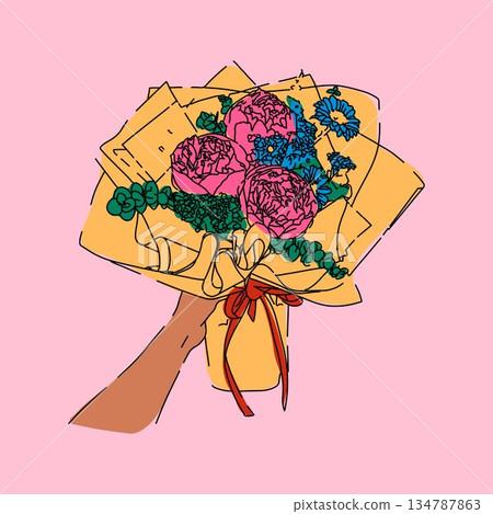Bouquet of flowers wrapped in yellow paper with a ribbon 134787863
