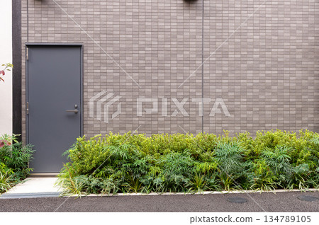 street wall background ,Industrial background, empty grunge urban street with warehouse brick wall 134789105
