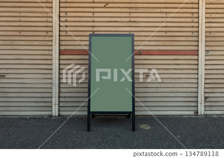 Large blank billboard on a street wall, banners with room to add your own text 134789118