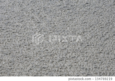 Gray wavy background. Mud photography 134789219