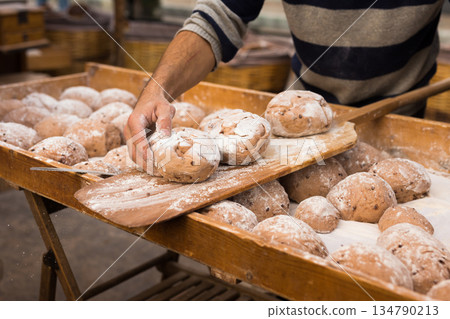 bread preparation. loaves of dough before baking bread preparation. loaves of dough before baking 134790213