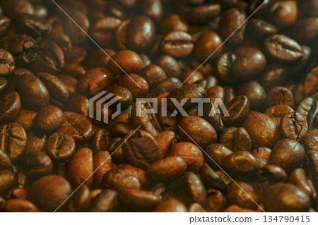 Roasted Coffee Beans with Steam and Haze Background Roasted Coffee Beans with Steam and Haze Background 134790415