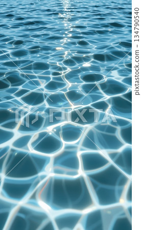 Bright Blue Sparkling Water Surface With Beautiful Light Caustics and Ripples 134790540