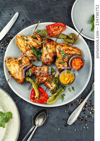 Chicken Wings on Wooden Sticks 134790752