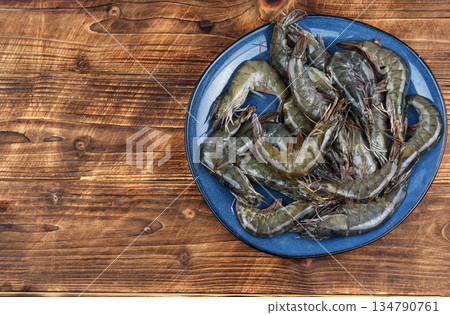 Raw scampi langoustines ready for cooking. 134790761