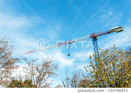 Crane ad blue sky 134790851