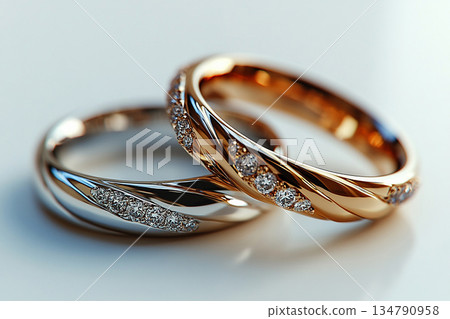 Pair of Wedding Rings on a white background. 134790958