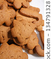 Golden Gingerbread Cookies in Fun Shapes, Perfect for Holiday Baking, Family Gatherings, and Sharing 134791328