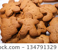 Gingerbread Men Cookies Piled High for Holiday Christmas Treats and Family Baking 134791329