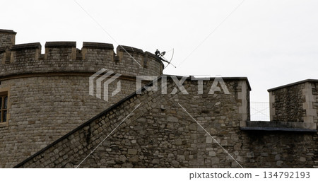 Archer on Castle Wall Prepares for Target Practice at Historic Site 134792193