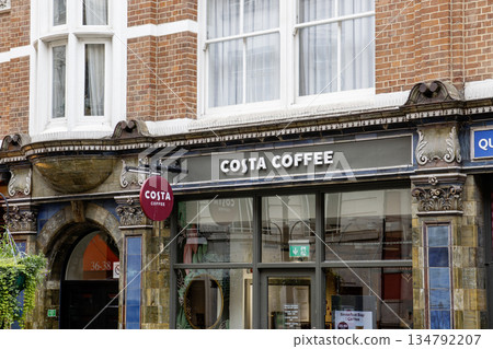 Costa Coffee Shop Exterior With Sign and Decorative Design on Building 134792207