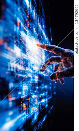A hand touching a futuristic interface on a touch screen 134792692