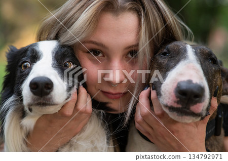 Joyful Moments with Two Adorable Dogs 134792971