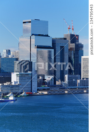 Office buildings line the coast of Tokyo Bay Office buildings line the coast of Tokyo Bay 134795443