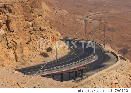 Road on the cliff at Ramon Crater in Mizpe Ramon in Negev desert, Israel Road on the cliff at Ramon Crater in Mizpe Ramon in Negev desert, Israel 134796100