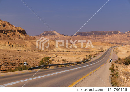 Scenic Desert Road in Israel Under Blue Sky 134796126