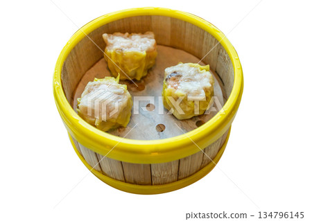 Top view of Pork dumplings in the yellow edge basket, focus selective Top view of Pork dumplings in the yellow edge basket, focus selective 134796145