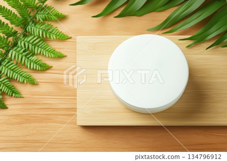 Minimalist Biodegradable Container on Wooden Surface with Green Leaves Surrounding Minimalist Biodegradable Container on Wooden Surface with Green Leaves Surrounding 134796912