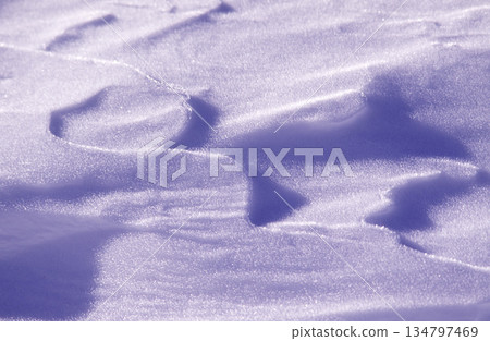Patterns on the snowy field created by the wind Patterns on the snowy field created by the wind 134797469