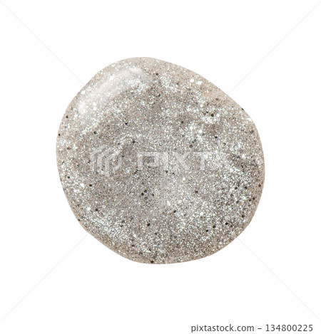 A sample of silver nail polish with a shimmer and metallic effect. Isolated on a white background. 134800225